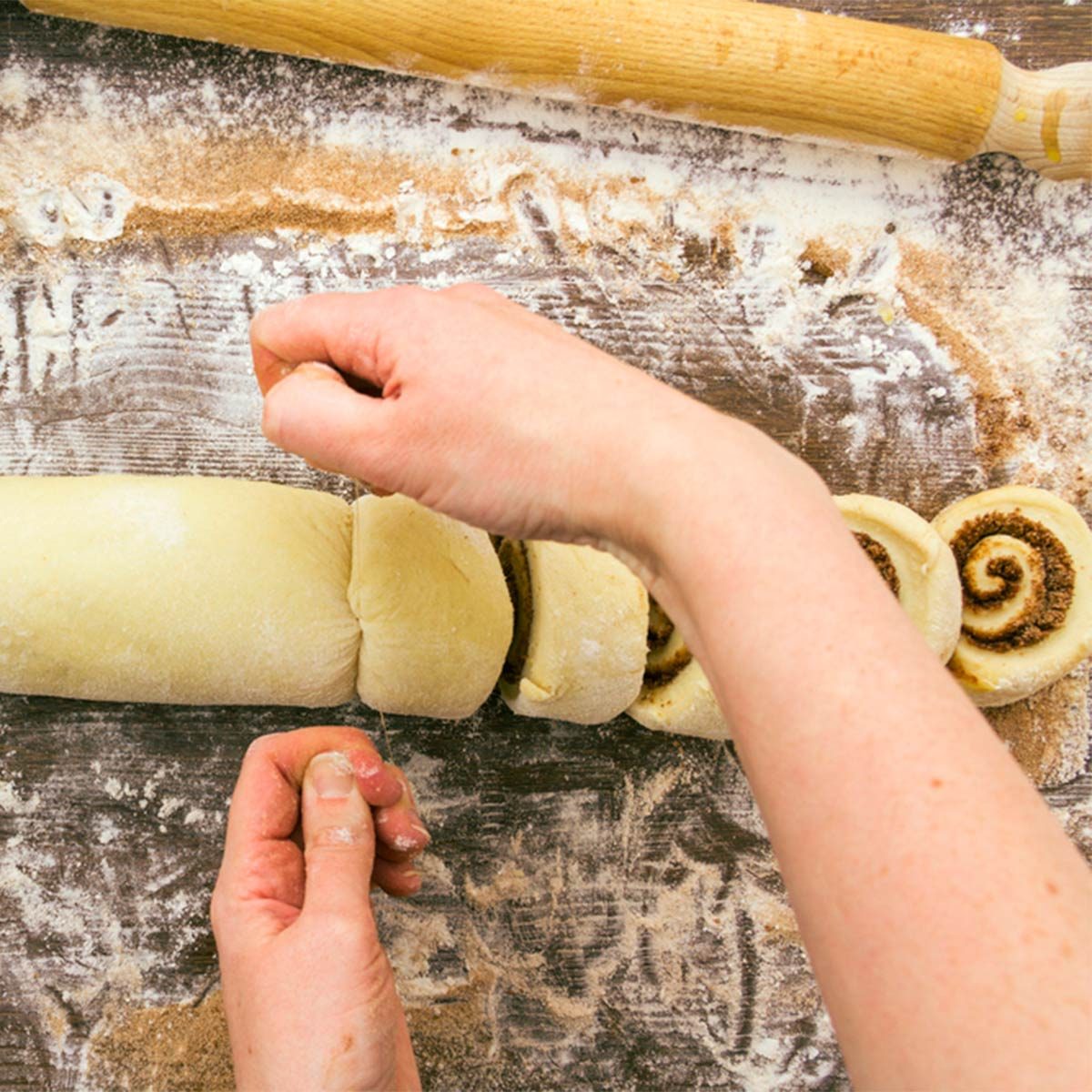 cutting cinnamon rolls with floss