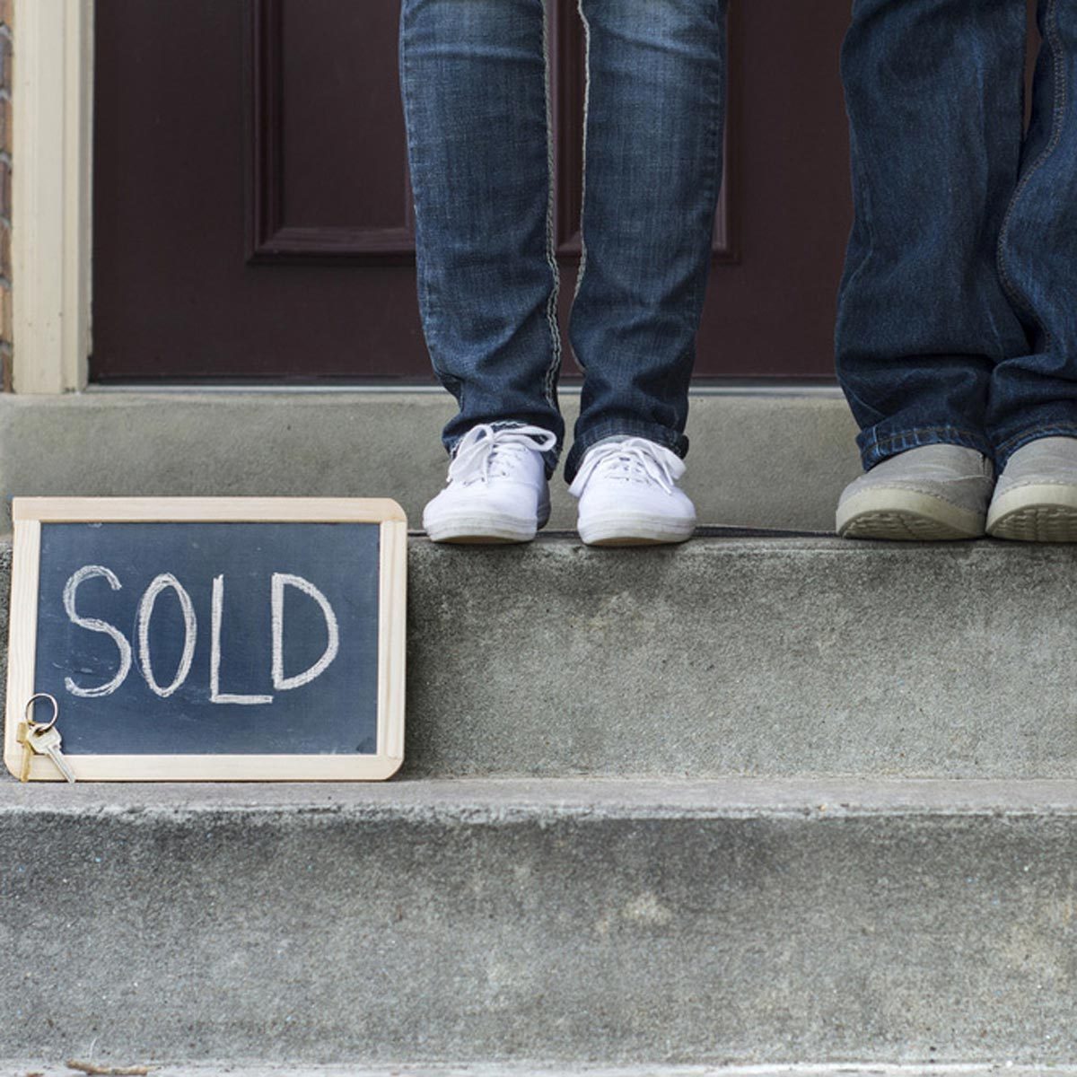 front stoop sold sign house home real-estate