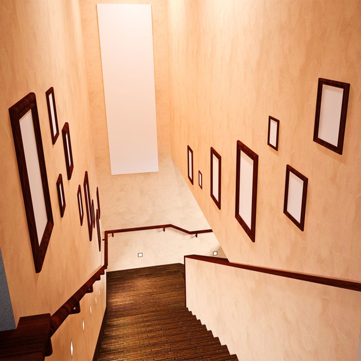 Stairs lead downwards, with wooden steps and a handrail. The walls are light-colored, adorned with empty frames, creating a simple, modern ambiance.