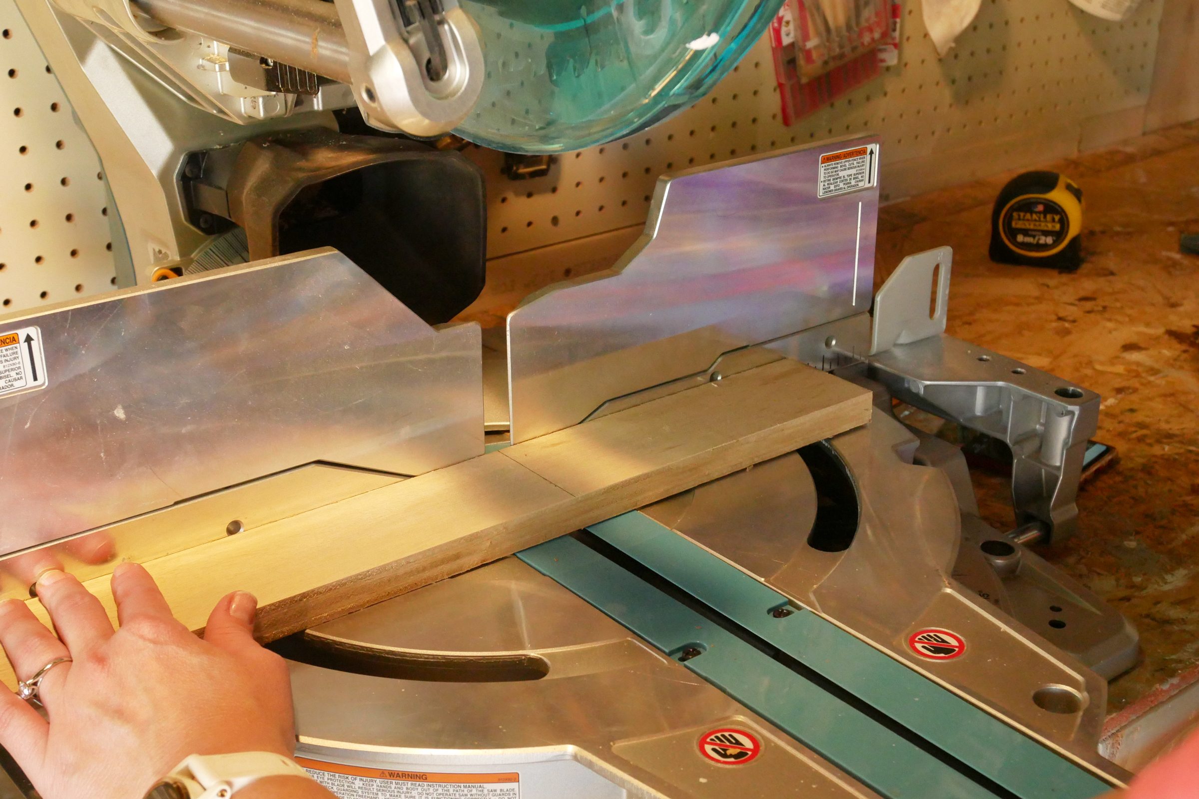 Step 2 Presstofencecama How To Use A Miter Saw Brittany Joyner For Fhm Jvedit