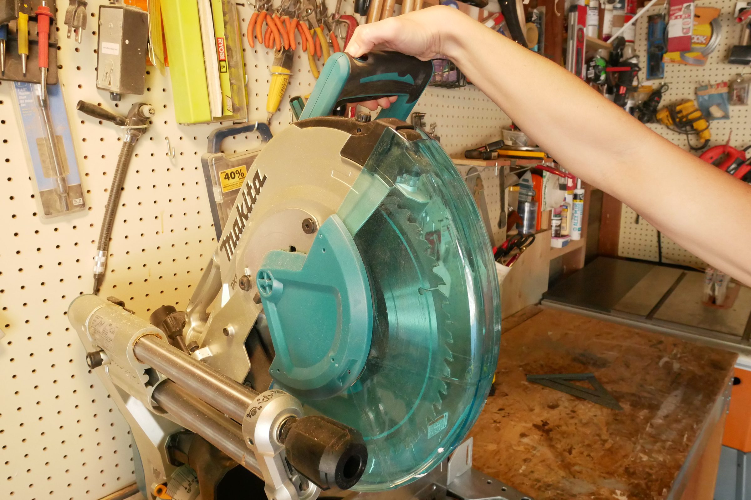 Step 2b Safetyreleaseandtriggercama How To Use A Miter Saw Brittany Joyner For Fhm Jvedit