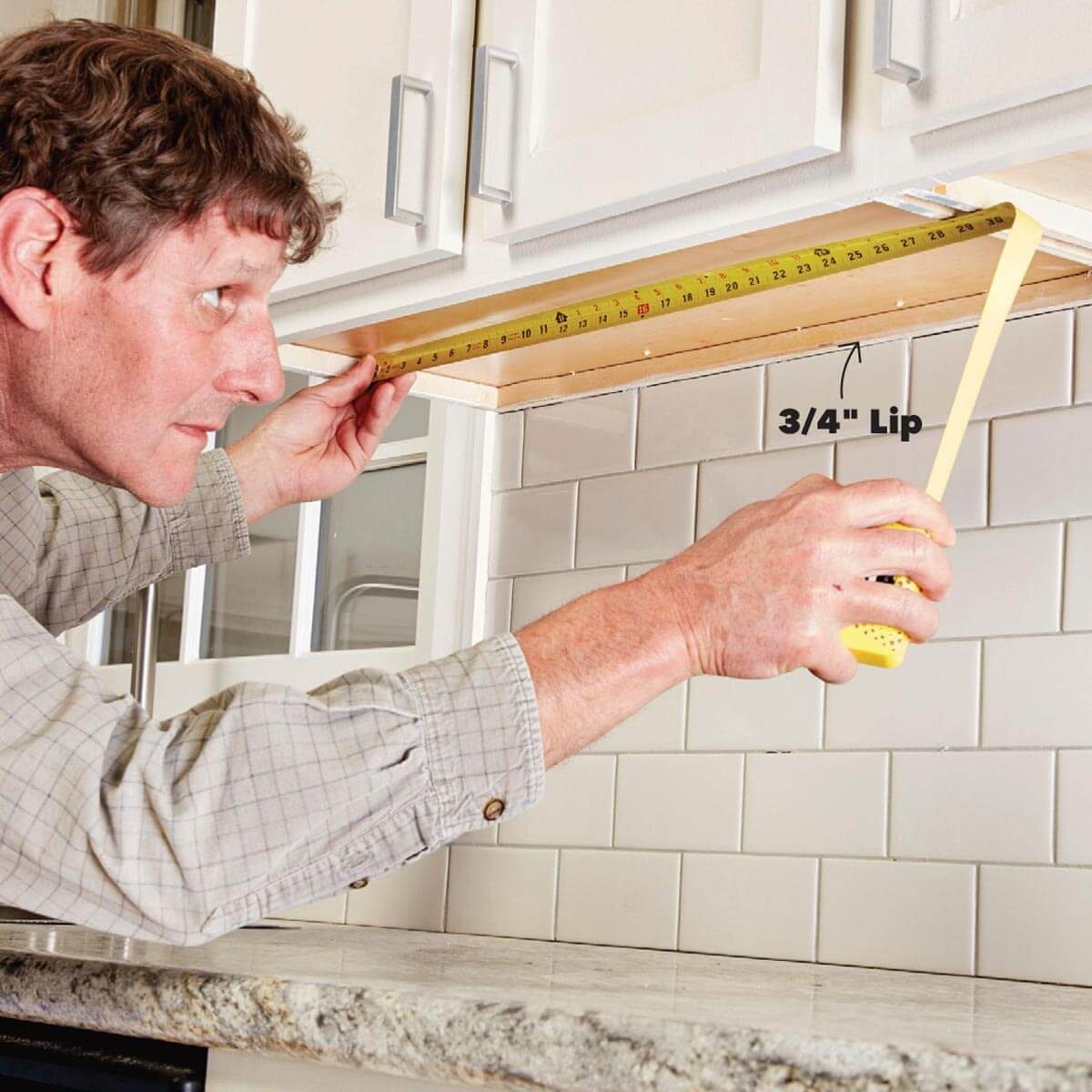 054_FHM_OCTNOV17-1 measure the cabinet bay