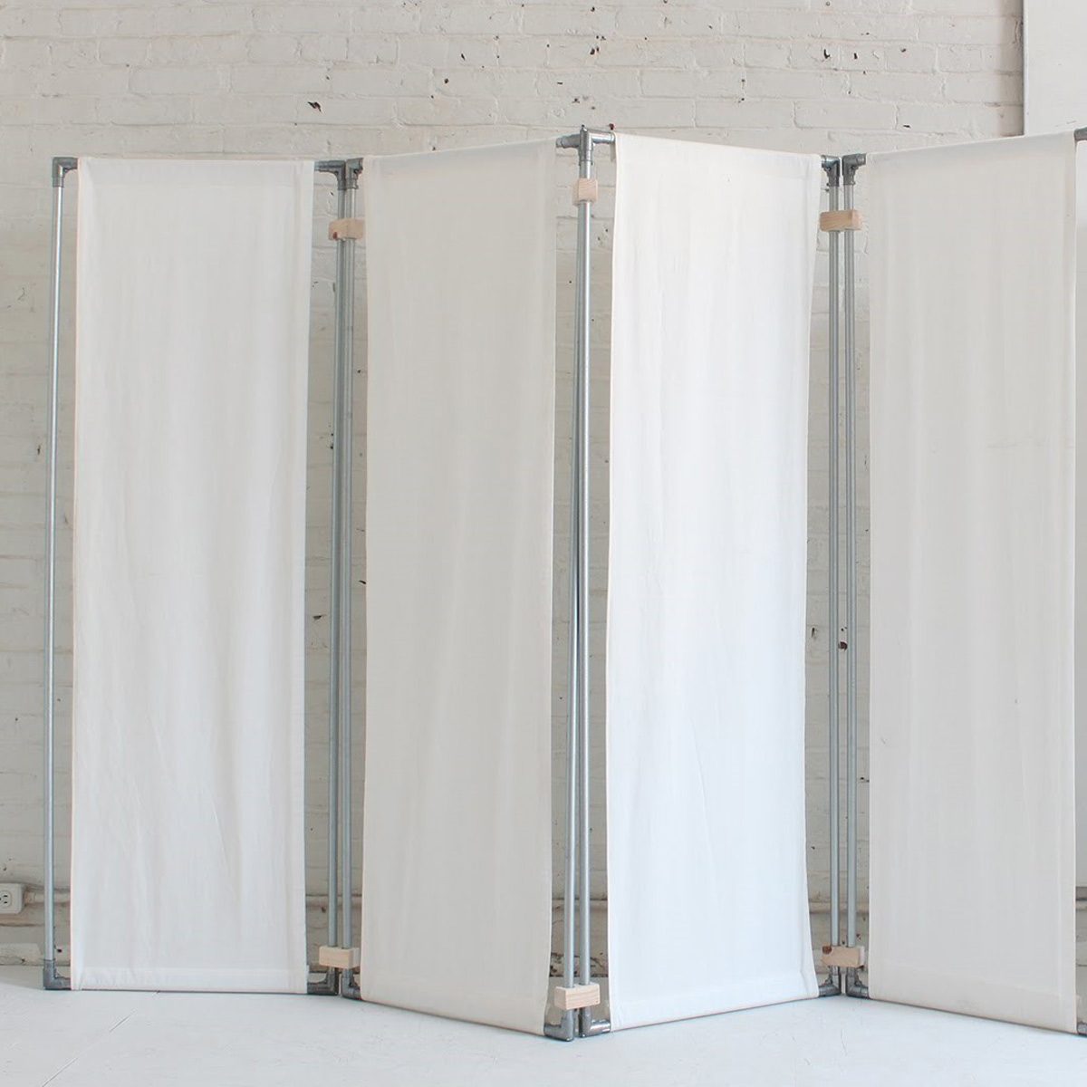 Fabric and Electrical Conduit Room Divider