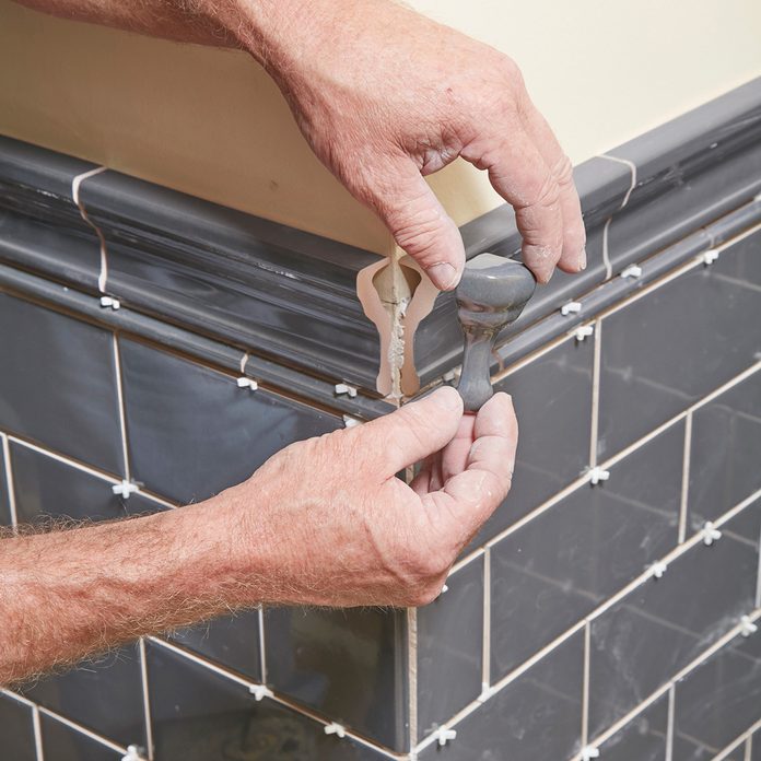 Add the corner cap tile