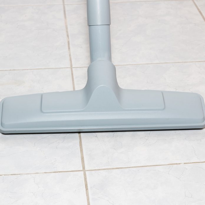 vacuum clean bathroom tile
