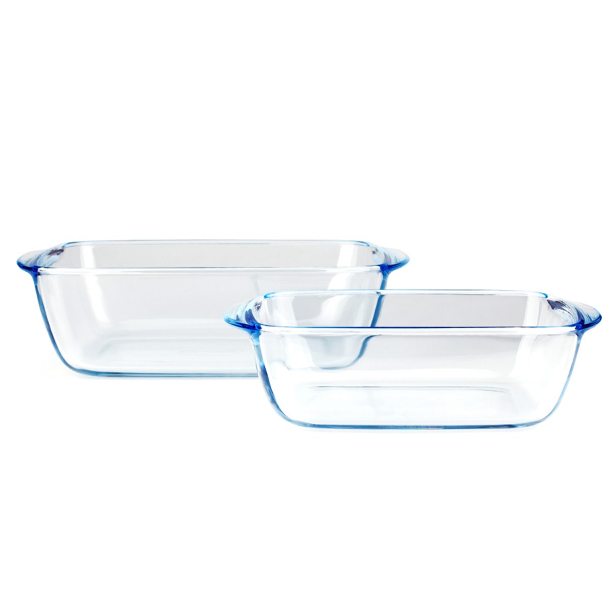 Two clear glass baking dishes are stacked, showcasing their rectangular shape and blue-tinted edges. The background is plain white.