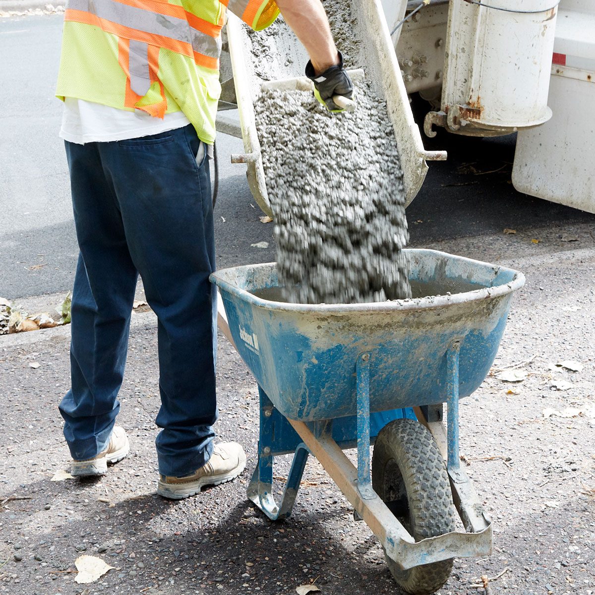 Concrete being poured out at a thick consistency | Construction Pro Tips