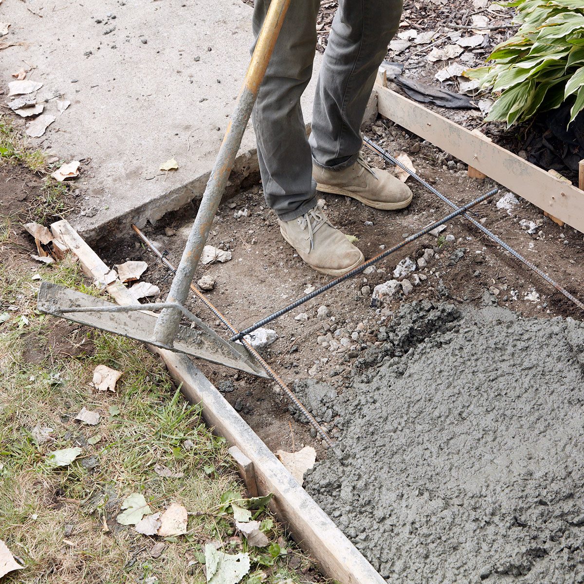 Lifting rebar with rake | Construction Pro Tips