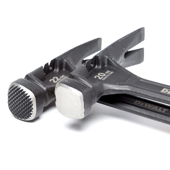 Two hammer heads laying on top of each other | Construction Pro Tips