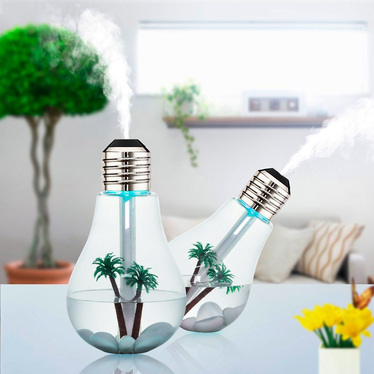 Four smart light bulbs and a control hub sit in front of a packaged product displaying promotional text for Philips Hue lighting.