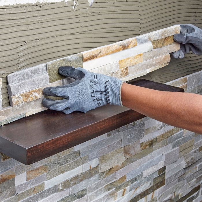 Laying stone over the shelf