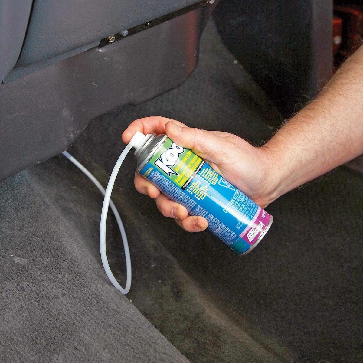 Injecting-mold-killing-foam-into-car-AC