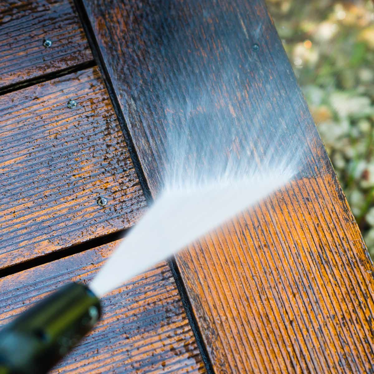 Pressure-washing-a-deck