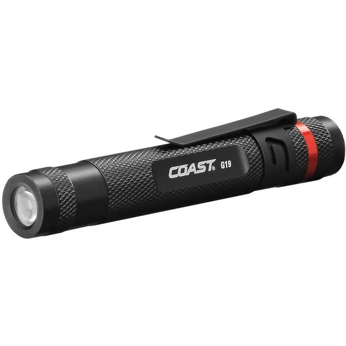 A compact black flashlight rests horizontally. It illuminates dark spaces, featuring a textured grip and a clip for easy carrying.