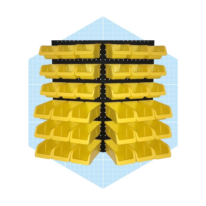 Yellow storage bins are arranged on a black shelving unit, organized neatly in rows against a light blue grid background.