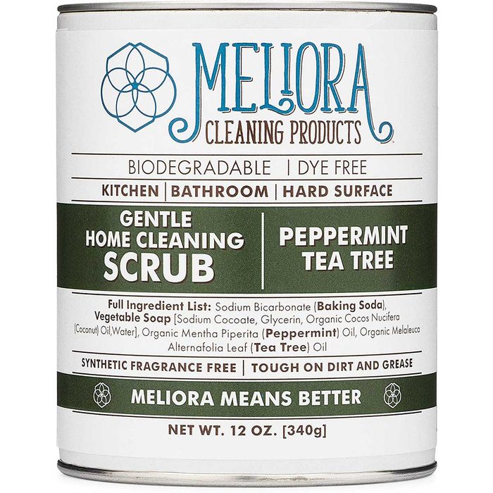 A container of cleaning scrub labeled 