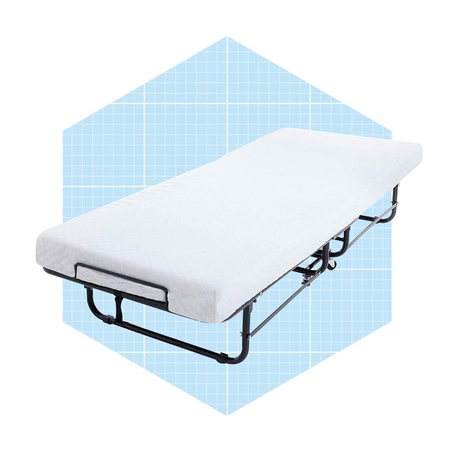 A foldable bed is displayed on a light blue grid background, showcasing its white mattress and black metal frame, designed for easy storage and use.