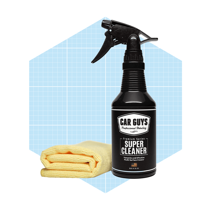 A black spray bottle labeled 