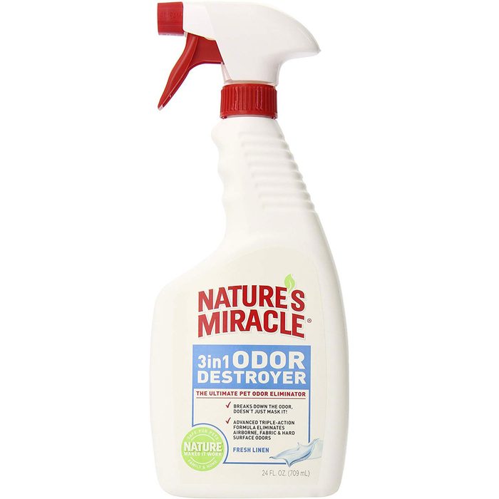 A white spray bottle labeled "Nature