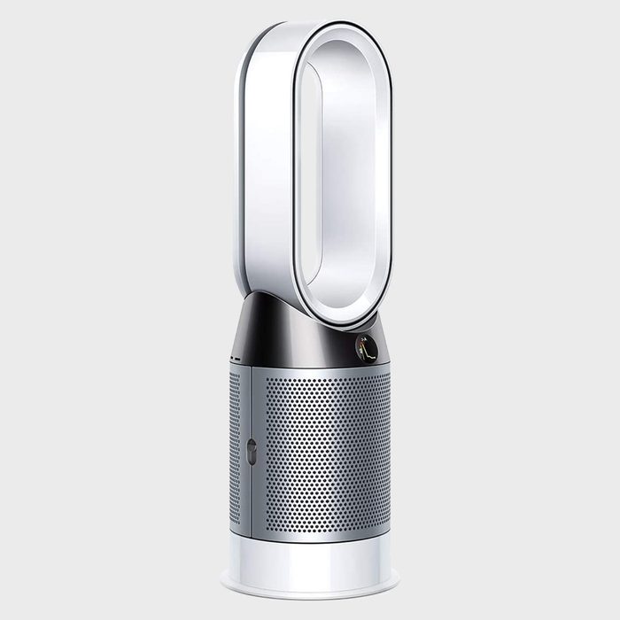 A sleek, modern air purifier blows air through a circular opening, positioned on a light gray background, designed for indoor air quality improvement.