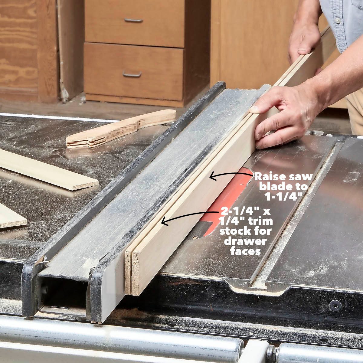 A person uses a table saw to cut wooden trim stock, adjusting the blade height while surrounded by a workshop environment and various wood pieces.