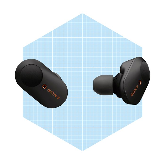 Two black wireless earbuds are displayed, emphasizing their design. They are set against a light blue grid background, highlighting their features and brand name.