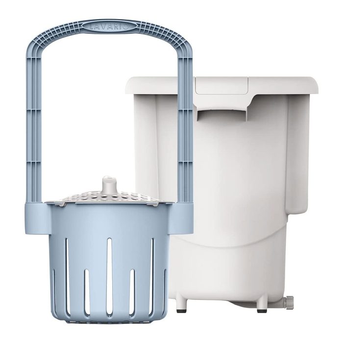 A blue basket with a handle sits in front of a white container, designed for washing items efficiently in a compact setup.
