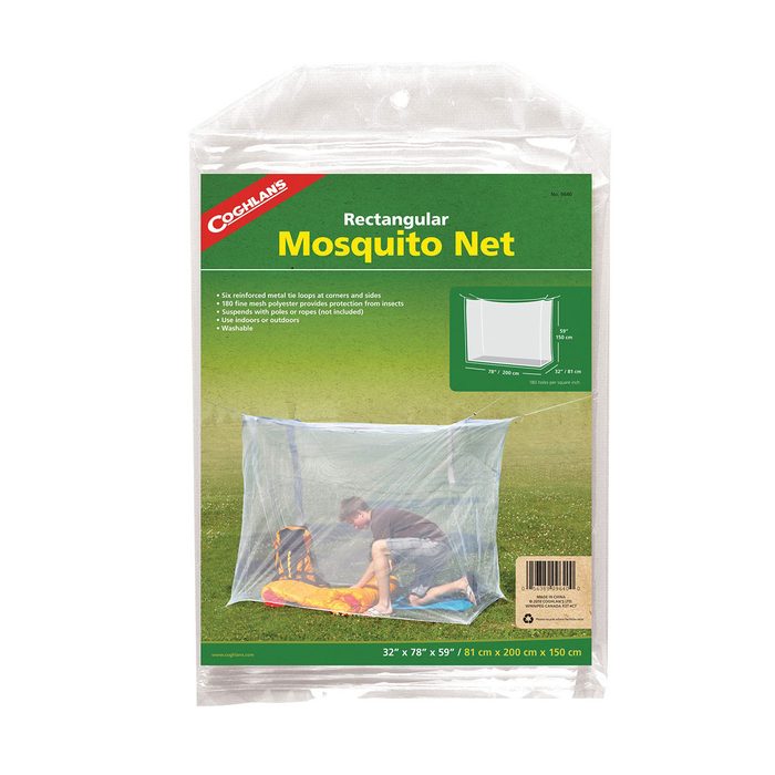 A rectangular mosquito net is packaged, displaying a person setting it up outdoors, providing insect protection while camping or relaxing on the grass.