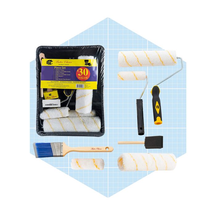 A set of painting tools includes rollers, brushes, and a paint tray, arranged on a light blue grid background, indicating preparation for a painting project.