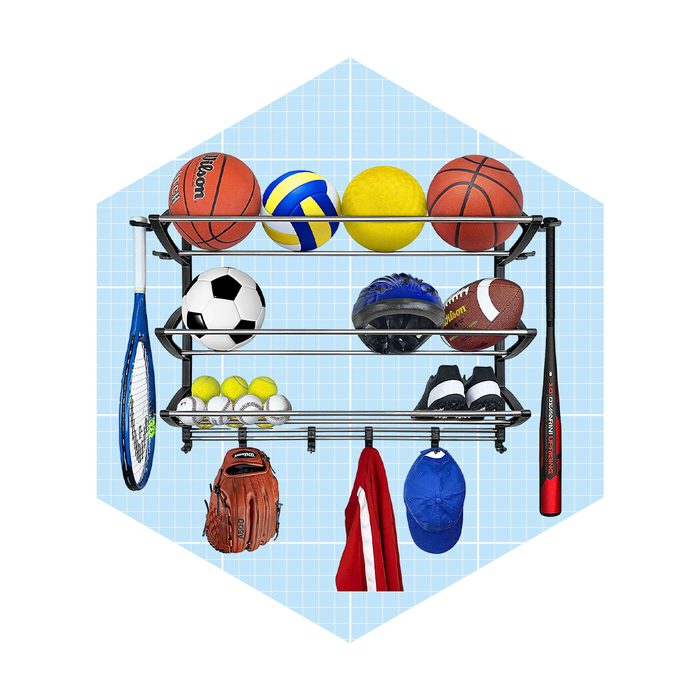 A multi-level shelf displays various sports equipment, including balls, a tennis racket, gloves, and apparel, set against a light blue grid background.