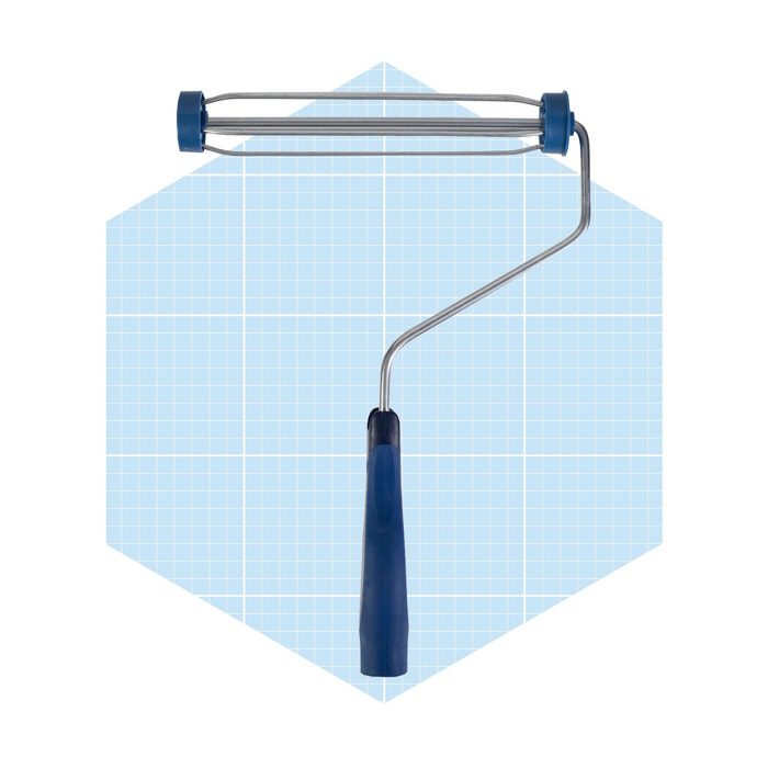 A paint roller with a blue handle rests on a light blue, grid-patterned background, suggesting preparation for painting or wall decoration.