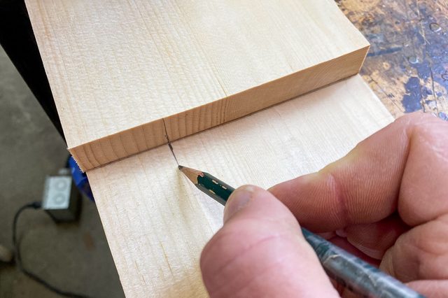 Drawing a Mark on Wood with Pencil