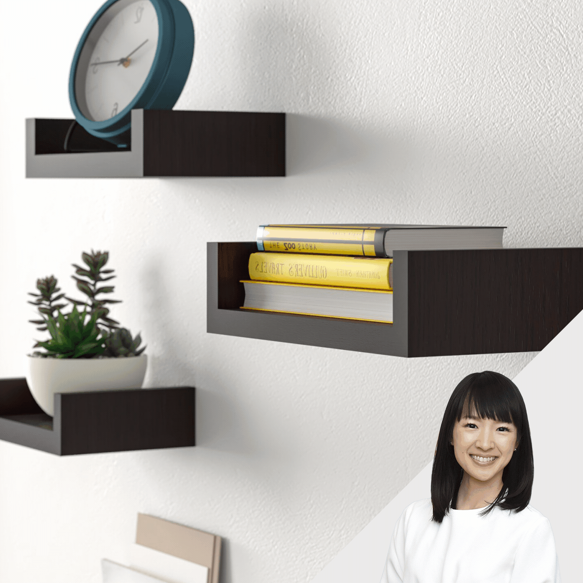 Dark wooden shelves hold books and a small potted plant against a textured white wall; a round clock hangs above them, displaying the time.