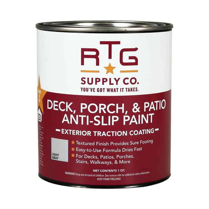 A can of anti-slip paint labeled for outdoor use. It provides traction and is designed for decks, patios, and walkways. The color is light gray.