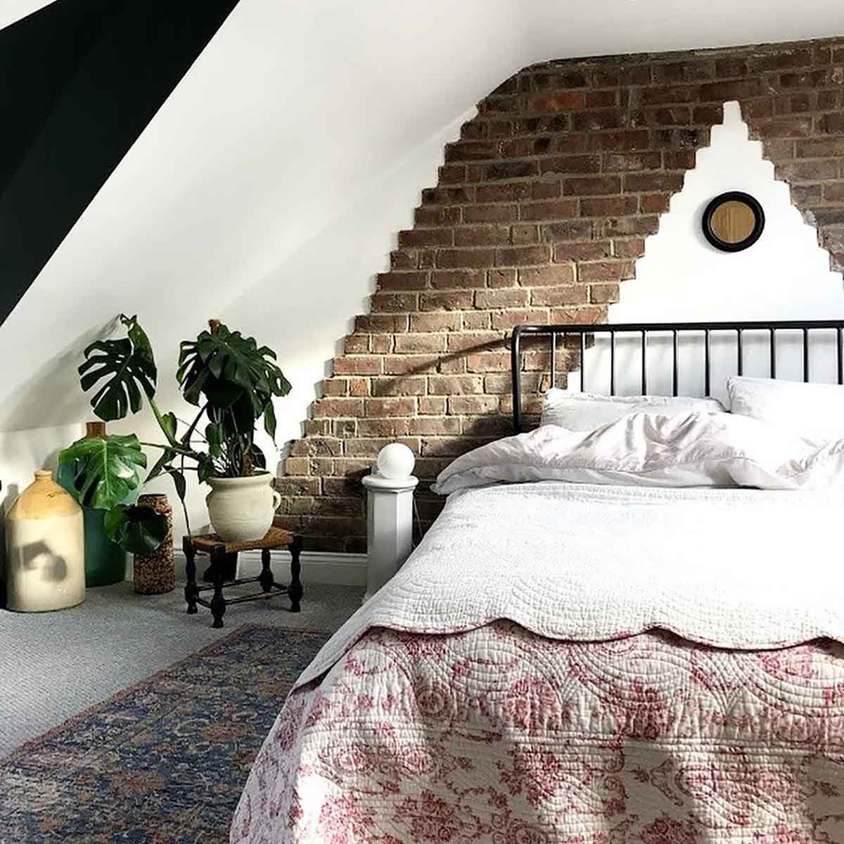 attic bedroom brick wall