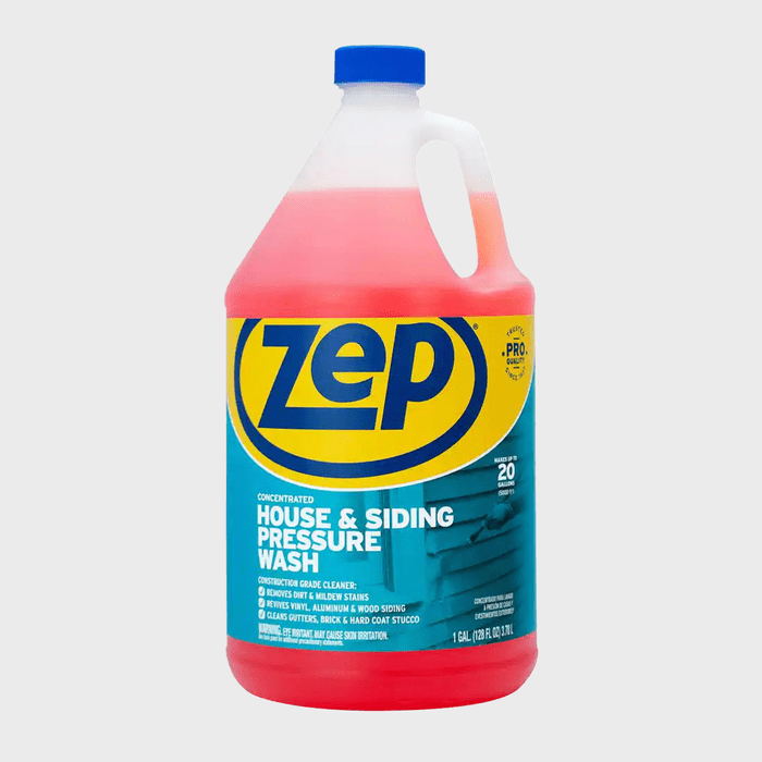 A gallon jug of Zep concentrated house and siding pressure wash is displayed, featuring bright blue and yellow labeling, suggesting its use for cleaning exterior surfaces.