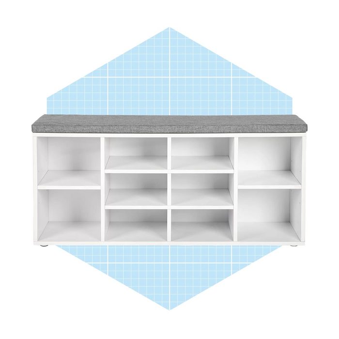 A white storage bench with a gray cushion sits against a light blue, grid-patterned background, featuring multiple compartments for organizing items.