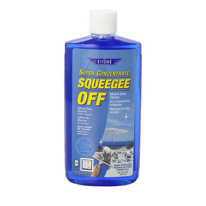 A blue bottle of window cleaner is displayed, labeled 