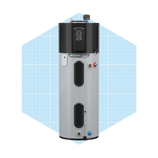 A cylindrical water heater stands upright, displaying control features at the top, surrounded by a light blue geometric background.