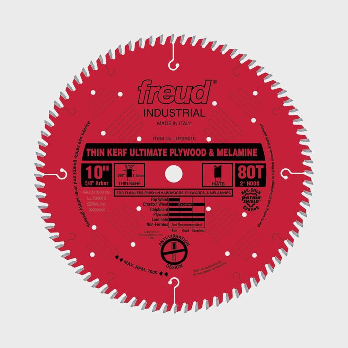 A circular saw blade with a red surface, labeled for cutting plywood and melamine, displays specifications and features, including an 80-tooth configuration.