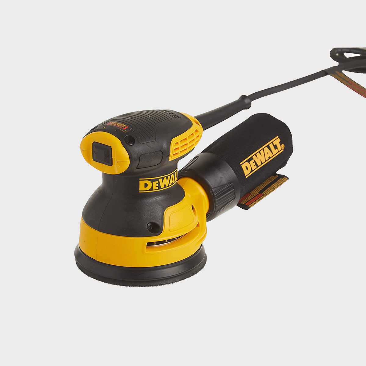 A yellow and black electric sander is positioned, with its sanding pad facing down, ready for use. It features a power cord and branding.