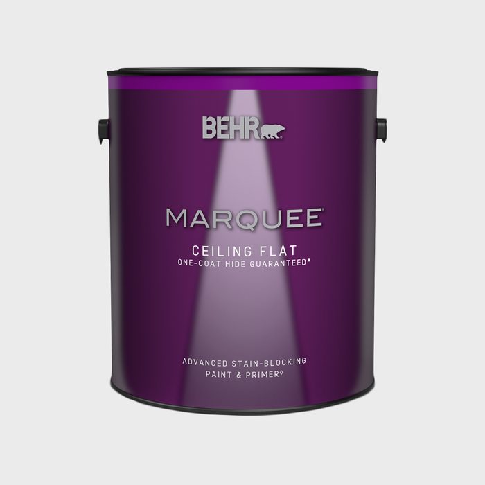 A purple paint can, labeled 