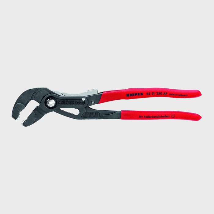 Pliers with red grips are positioned horizontally, designed to grasp and manipulate objects. The background is neutral, emphasizing the tool