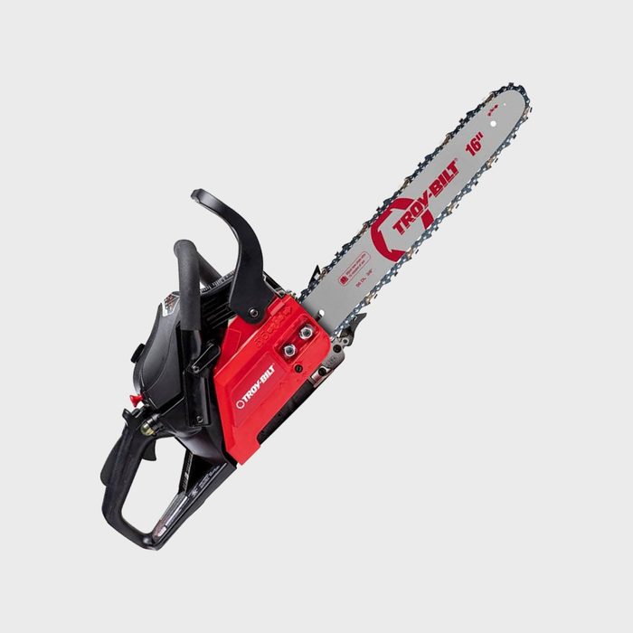 A chainsaw with a red and black design is positioned diagonally, showcasing its 16-inch blade, ready for cutting in outdoor settings.