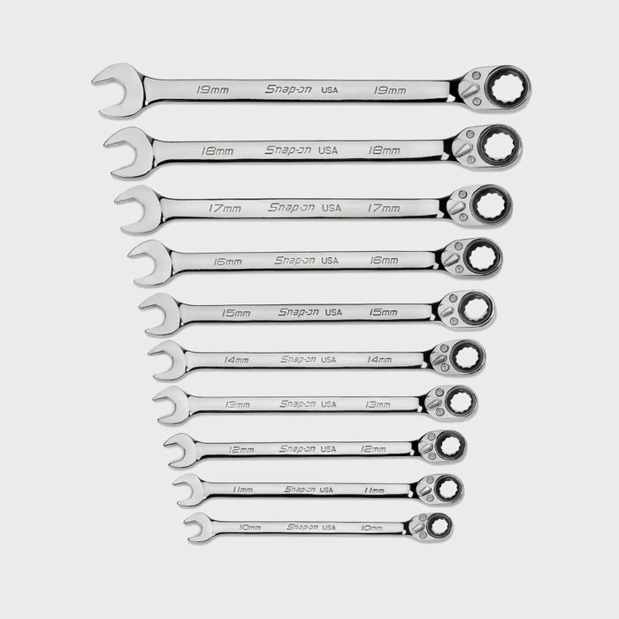 A set of chrome wrenches of varying sizes is neatly arranged in a row. Each tool displays its size in millimeters, showcasing a polished finish.