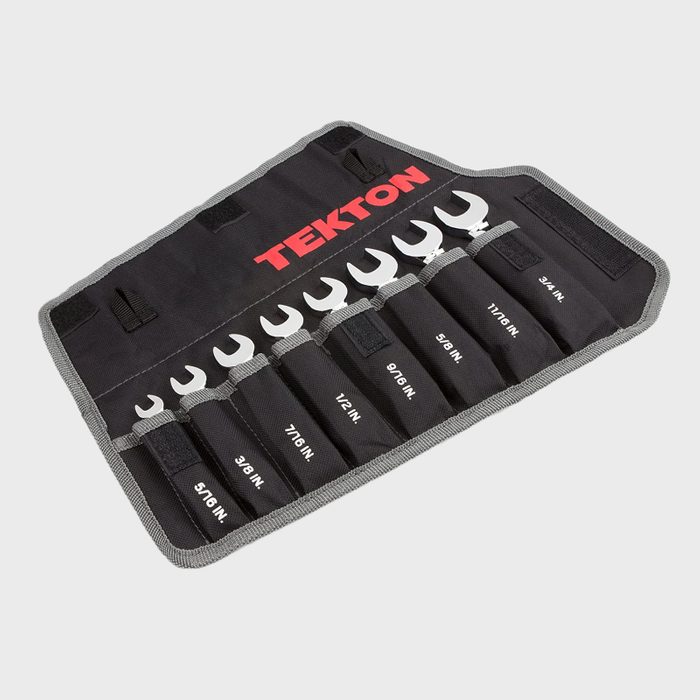 A set of silver wrenches displayed in a black fabric holder with compartments, labeled with sizes, resting on a light background.