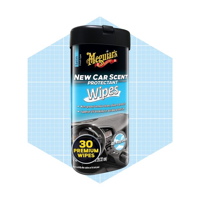 Container of car cleaning wipes sits upright. It contains 30 wipes designed to clean and protect surfaces. Background features a light, geometric pattern.