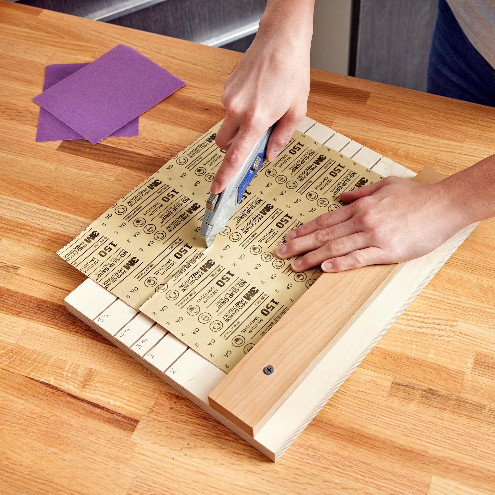 cutting sandpaper