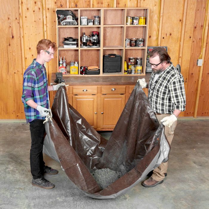 mixing concrete with a tarp