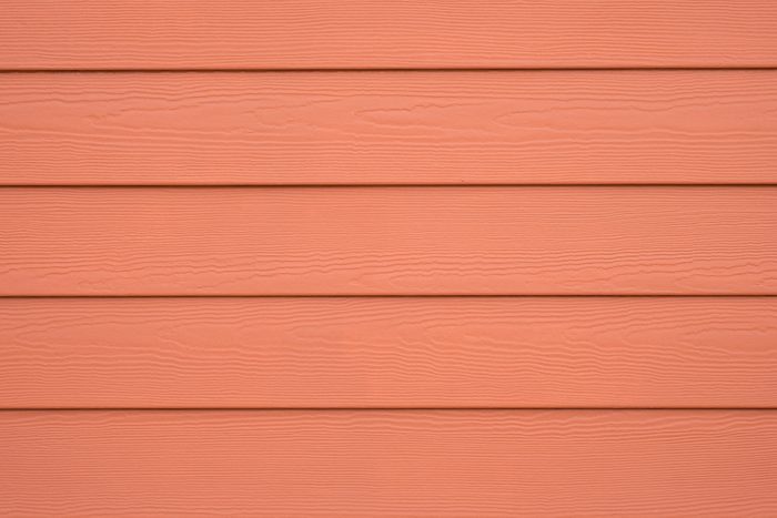 WOOD SUBSTITUTE WALL SIDING FOR BACKGROUND , ORANGE COLOR